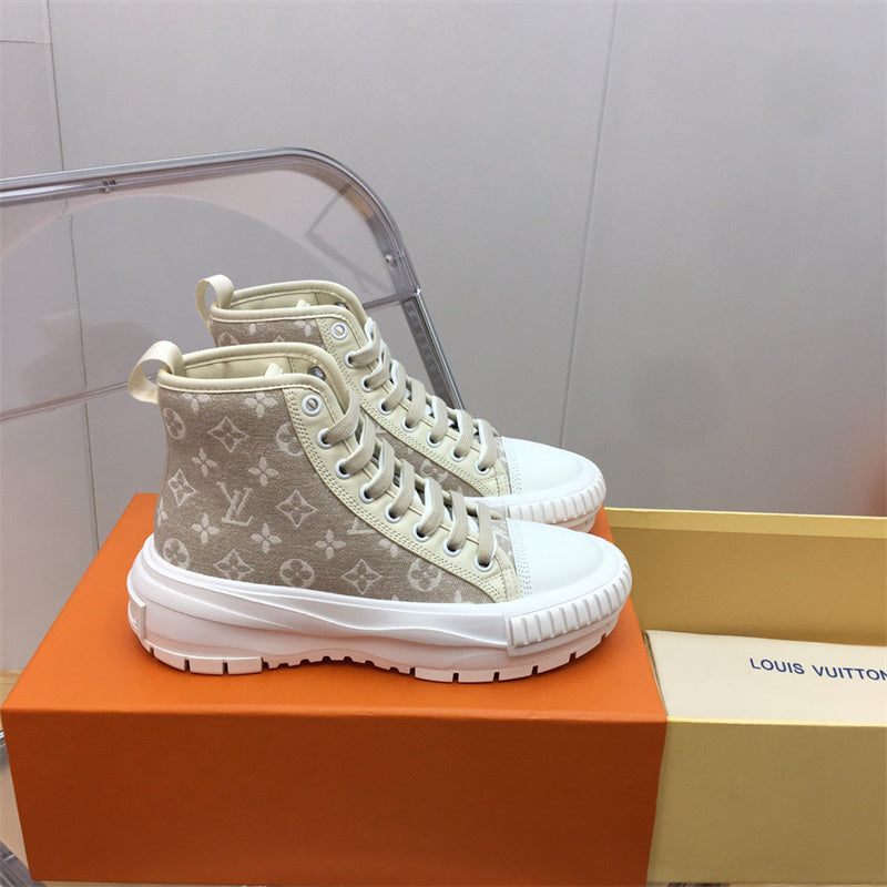 Louis Vuitton Black High-Top Sneakers - Angled View