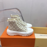 Louis Vuitton Black High-Top Sneakers - Angled View
