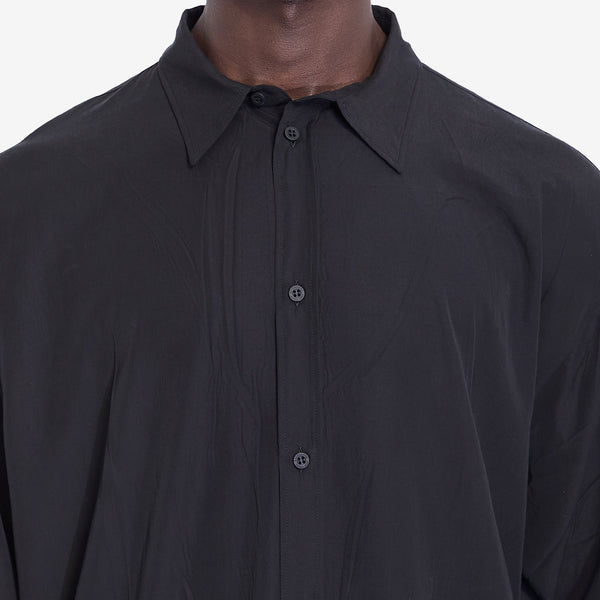 Close-up of Balenciaga shirts hardware and fine stitching