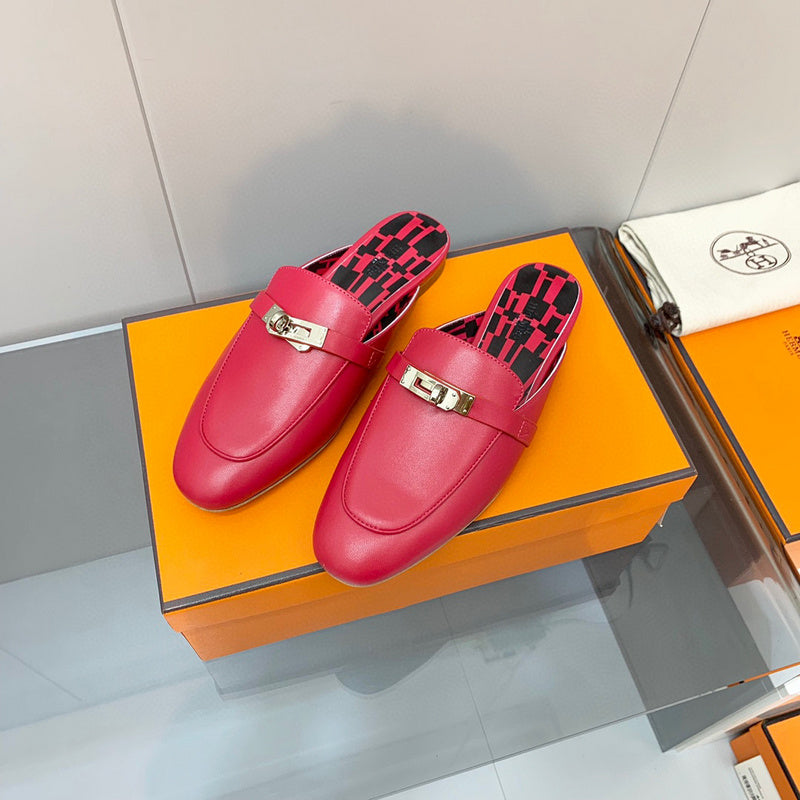 Hermes sandals Style 184 - close-up of classic monogram styling