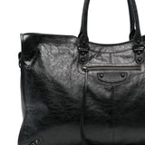 Close-up of Balenciaga handbags hardware and fine stitching
