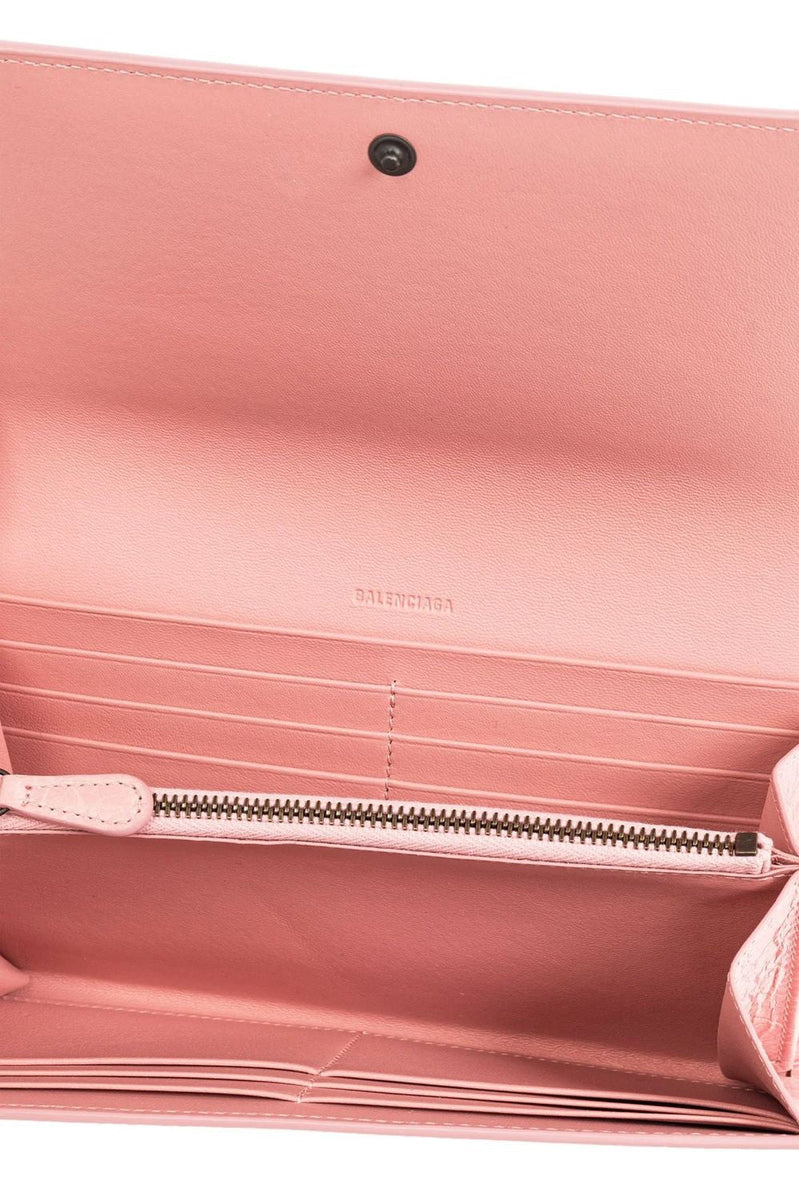 Close-up of Balenciaga small leather goods hardware and fine stitching