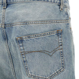 Close-up of Balenciaga pants hardware and fine stitching