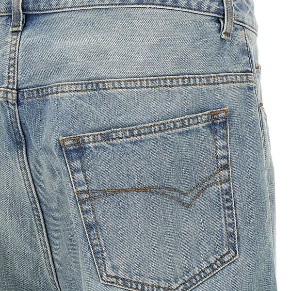 Close-up of Balenciaga pants hardware and fine stitching