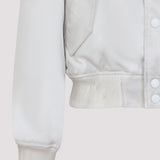 Close-up of Balenciaga outerwear hardware and fine stitching