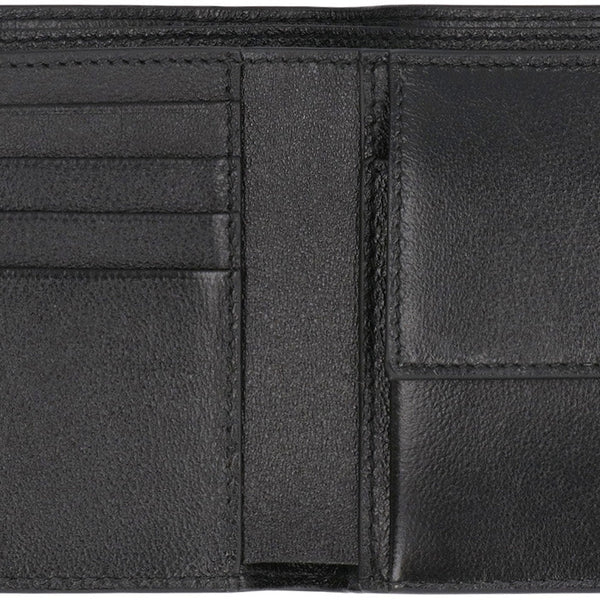 Close-up of Balenciaga small leather goods hardware and fine stitching