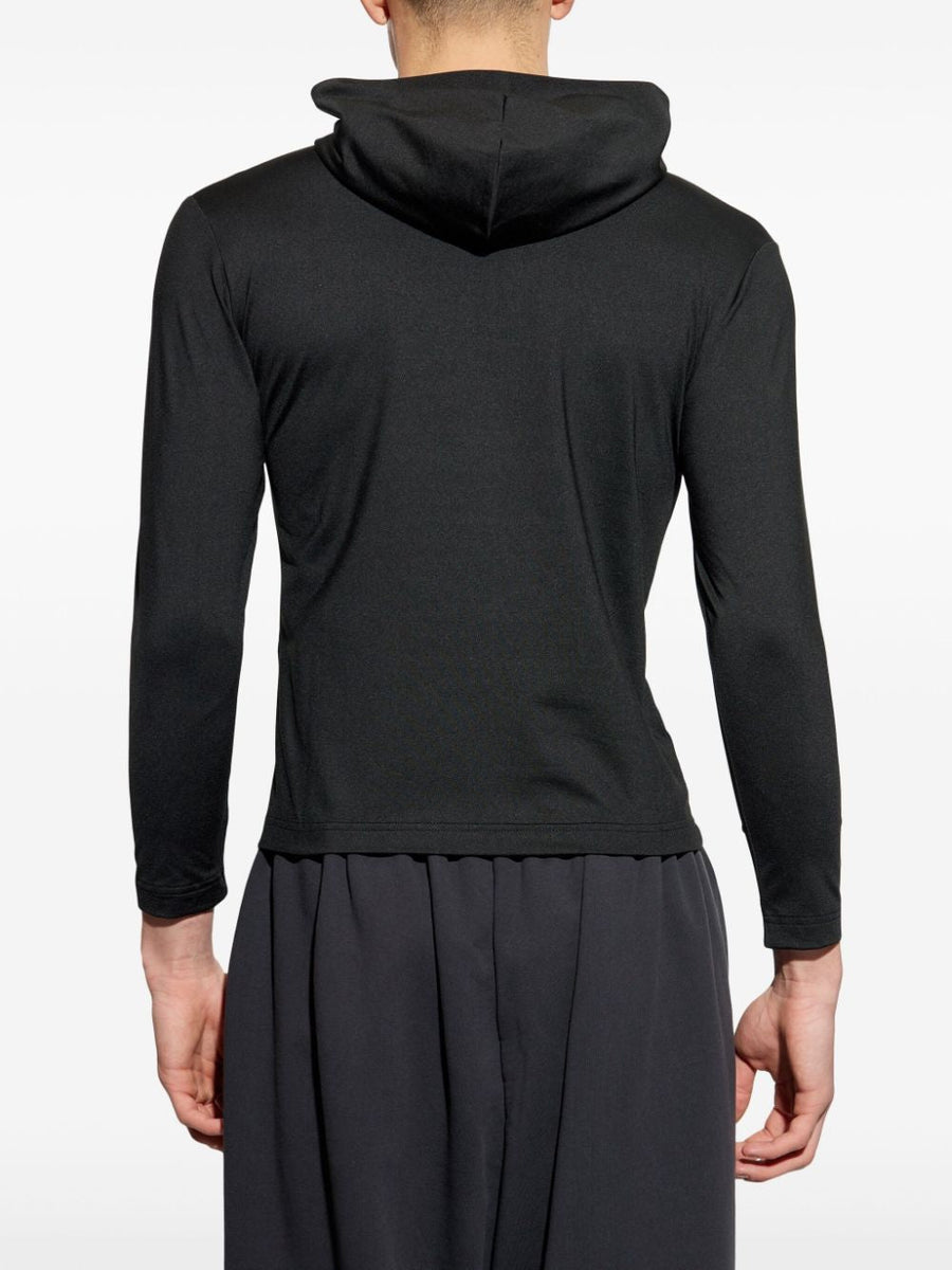 Close-up of Balenciaga jerseys & knitwear hardware and fine stitching