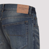 Close-up of Balenciaga pants hardware and fine stitching