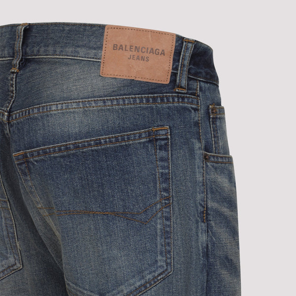 Close-up of Balenciaga pants hardware and fine stitching