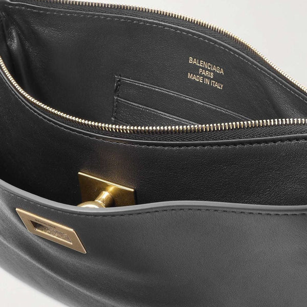 Close-up of Balenciaga shopping bags hardware and fine stitching