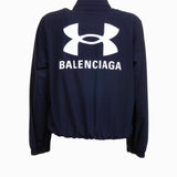 Close-up of Balenciaga outerwear hardware and fine stitching