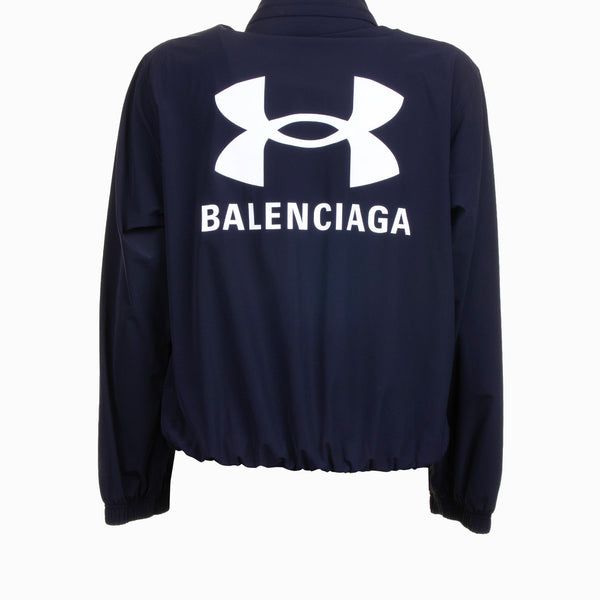 Close-up of Balenciaga outerwear hardware and fine stitching