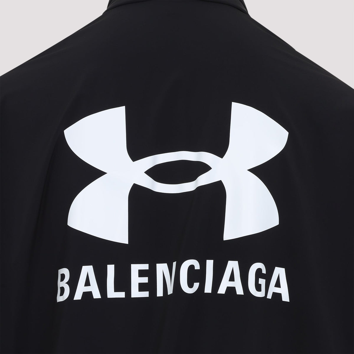 Close-up of Balenciaga outerwear hardware and fine stitching