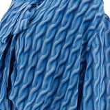 Close-up of Balenciaga dresses hardware and fine stitching
