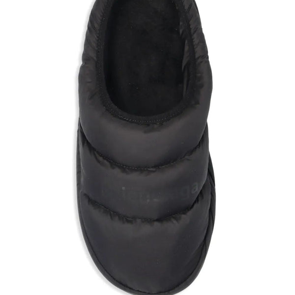 Close-up of Balenciaga sandals hardware and fine stitching