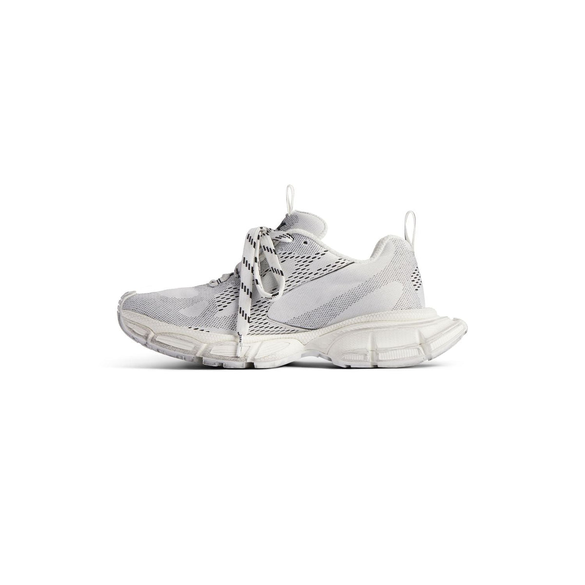 Close-up of Balenciaga sneakers hardware and fine stitching