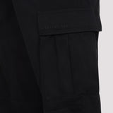 Close-up of Balenciaga pants hardware and fine stitching