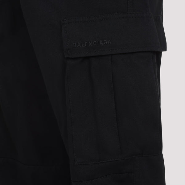 Close-up of Balenciaga pants hardware and fine stitching