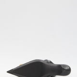Close-up of Balenciaga pumps hardware and fine stitching