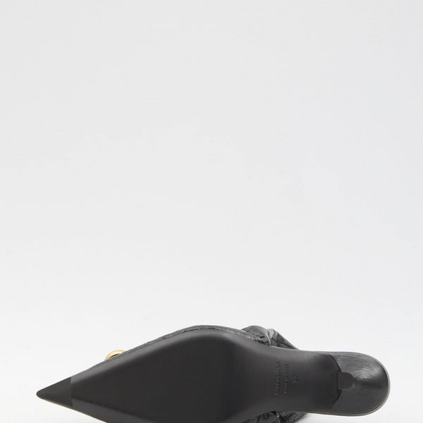 Close-up of Balenciaga pumps hardware and fine stitching