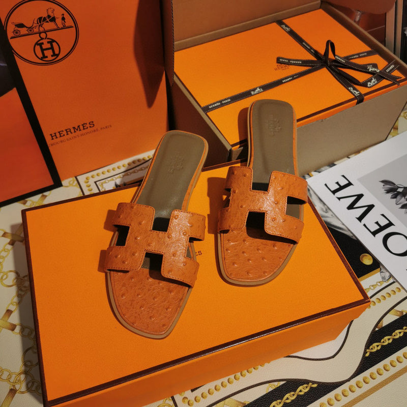 Hermès Burgundy Gladiator Sandals - Angled View