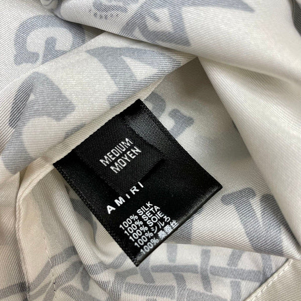 Three-quarter angle view of Amiri luxury piece style No.097