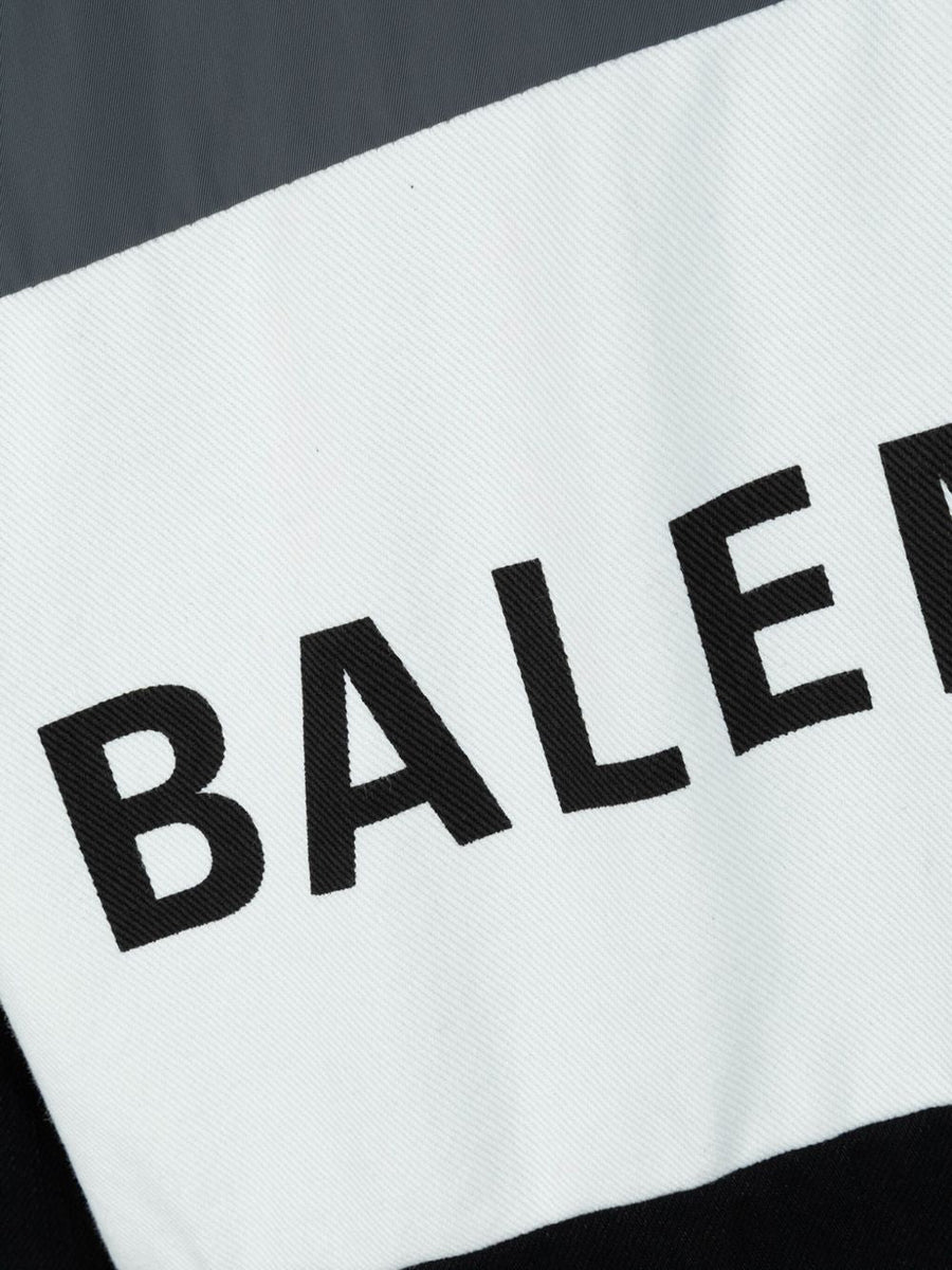 Balenciaga outerwear side profile designer luxury fashion