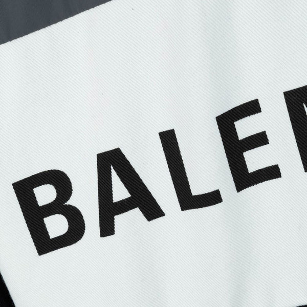 Balenciaga outerwear side profile designer luxury fashion