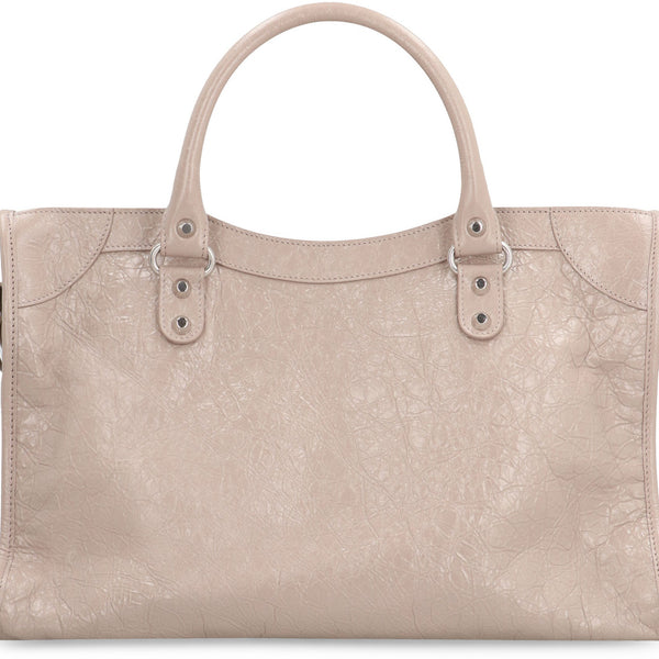 Close-up of Balenciaga handbags hardware and fine stitching