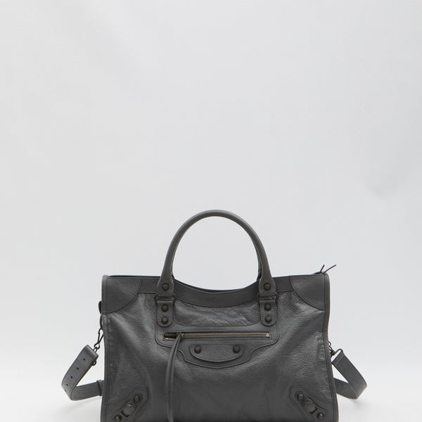 Close-up of Balenciaga shopping bags hardware and fine stitching