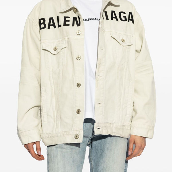 Close-up of Balenciaga outerwear hardware and fine stitching