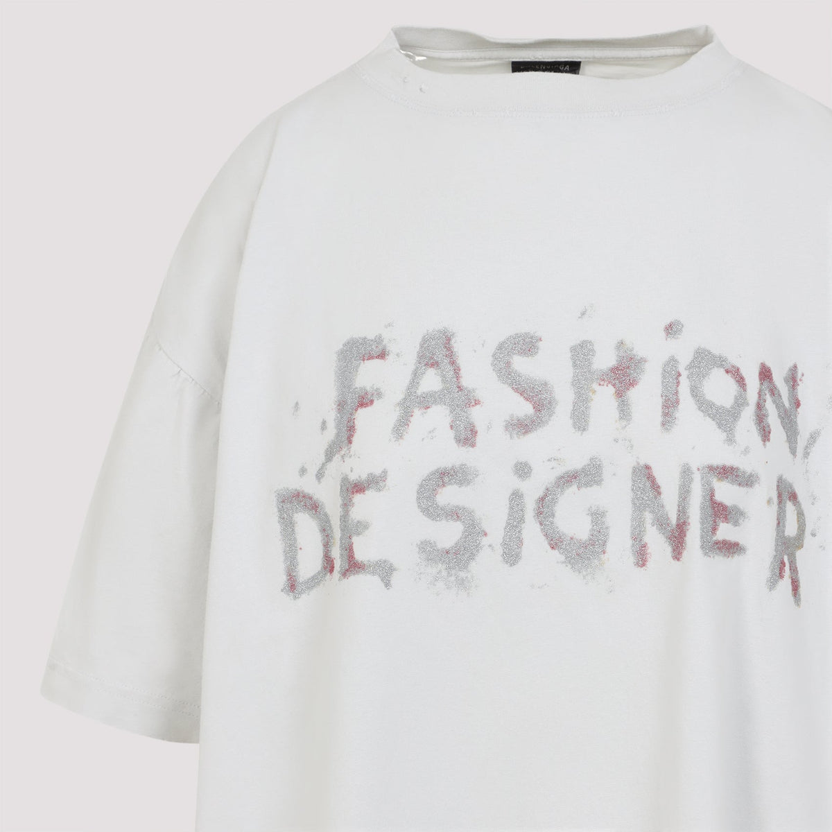 Close-up of Balenciaga t-shirts & tops hardware and fine stitching