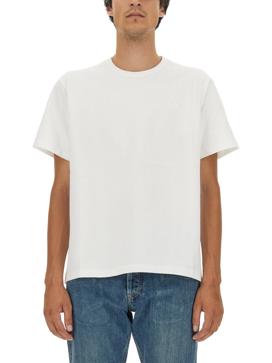 Close-up of Alexander McQueen tee shirts hardware and fine stitching