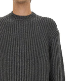 Close-up of Alexander McQueen sweaters & pullovers hardware and fine stitching