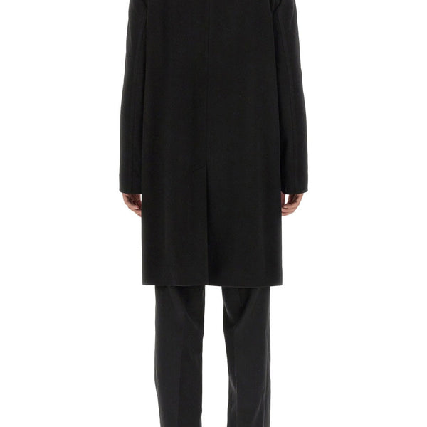 Alexander McQueen coats side profile designer luxury fashion