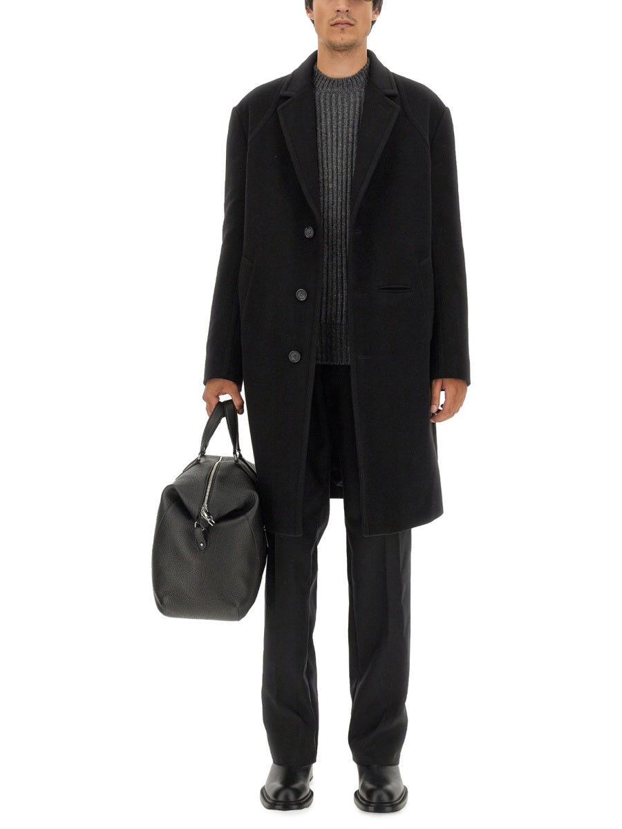 Alexander McQueen premium coats detail and craftsmanship close-up
