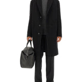 Alexander McQueen premium coats detail and craftsmanship close-up