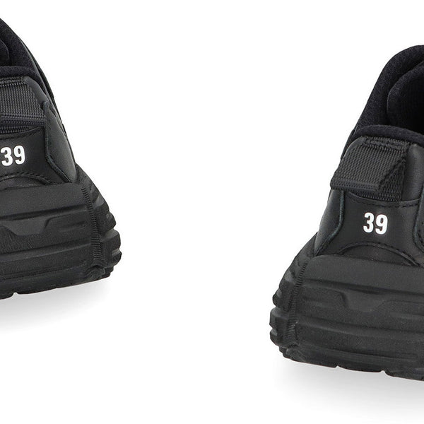Close-up of Balenciaga sneakers hardware and fine stitching
