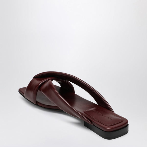 Close-up of Bottega Veneta sandals hardware and fine stitching