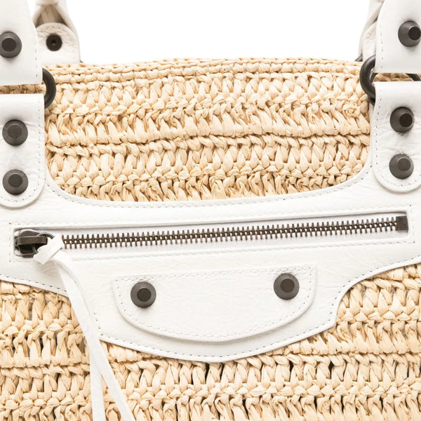 Close-up of Balenciaga handbags hardware and fine stitching
