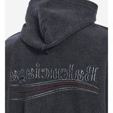 Close-up of Balenciaga jerseys & knitwear hardware and fine stitching