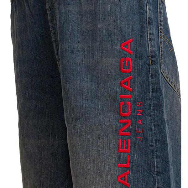 Close-up of Balenciaga pants hardware and fine stitching