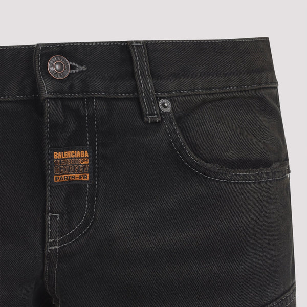 Close-up of Balenciaga pants hardware and fine stitching
