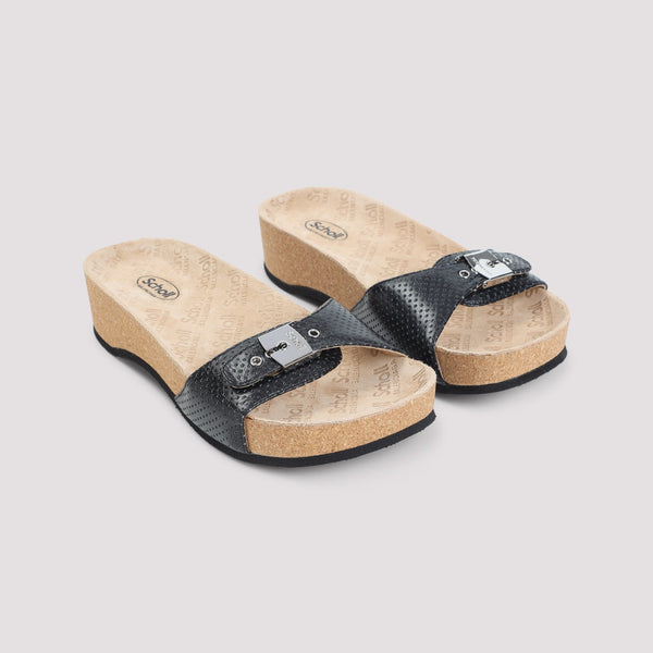 Close-up of Balenciaga sandals hardware and fine stitching