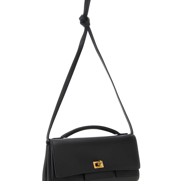 Balenciaga clutches side profile designer luxury fashion