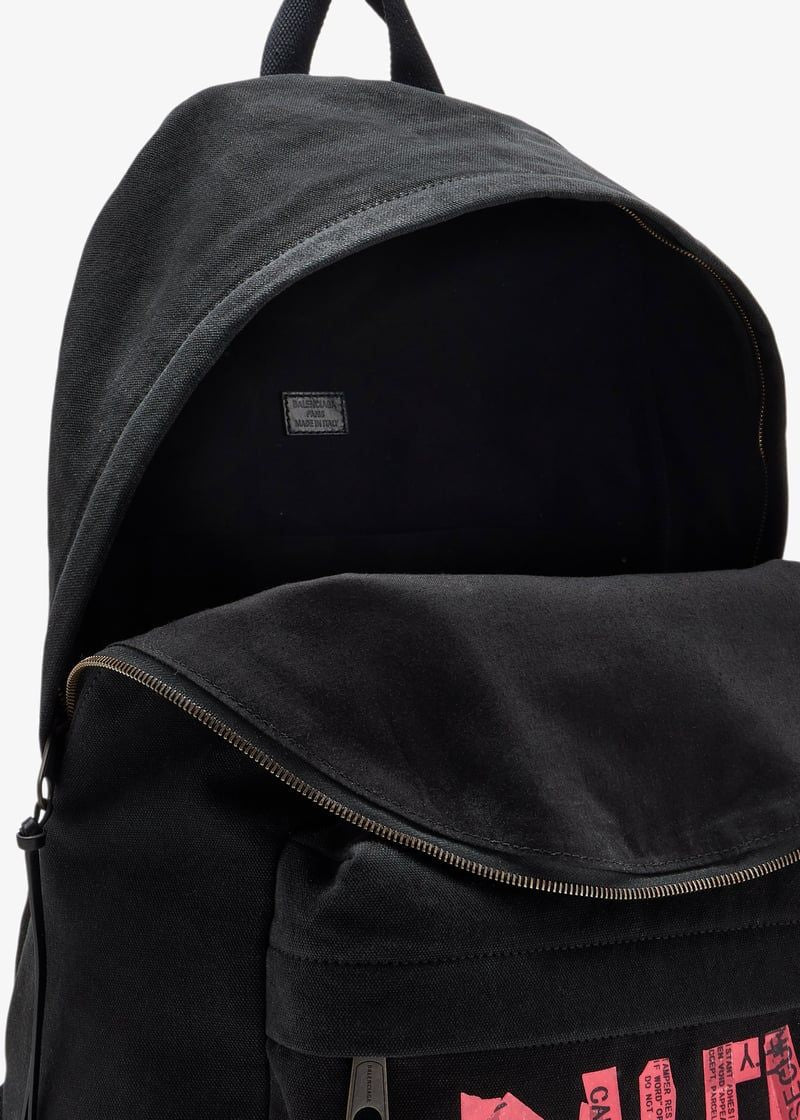 Close-up of Balenciaga backpacks hardware and fine stitching