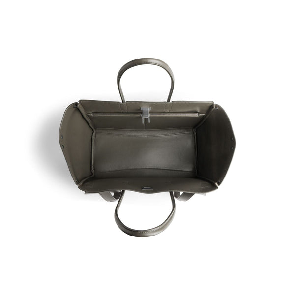Close-up of Balenciaga totes hardware and fine stitching