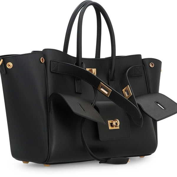 Close-up of Balenciaga handbags hardware and fine stitching