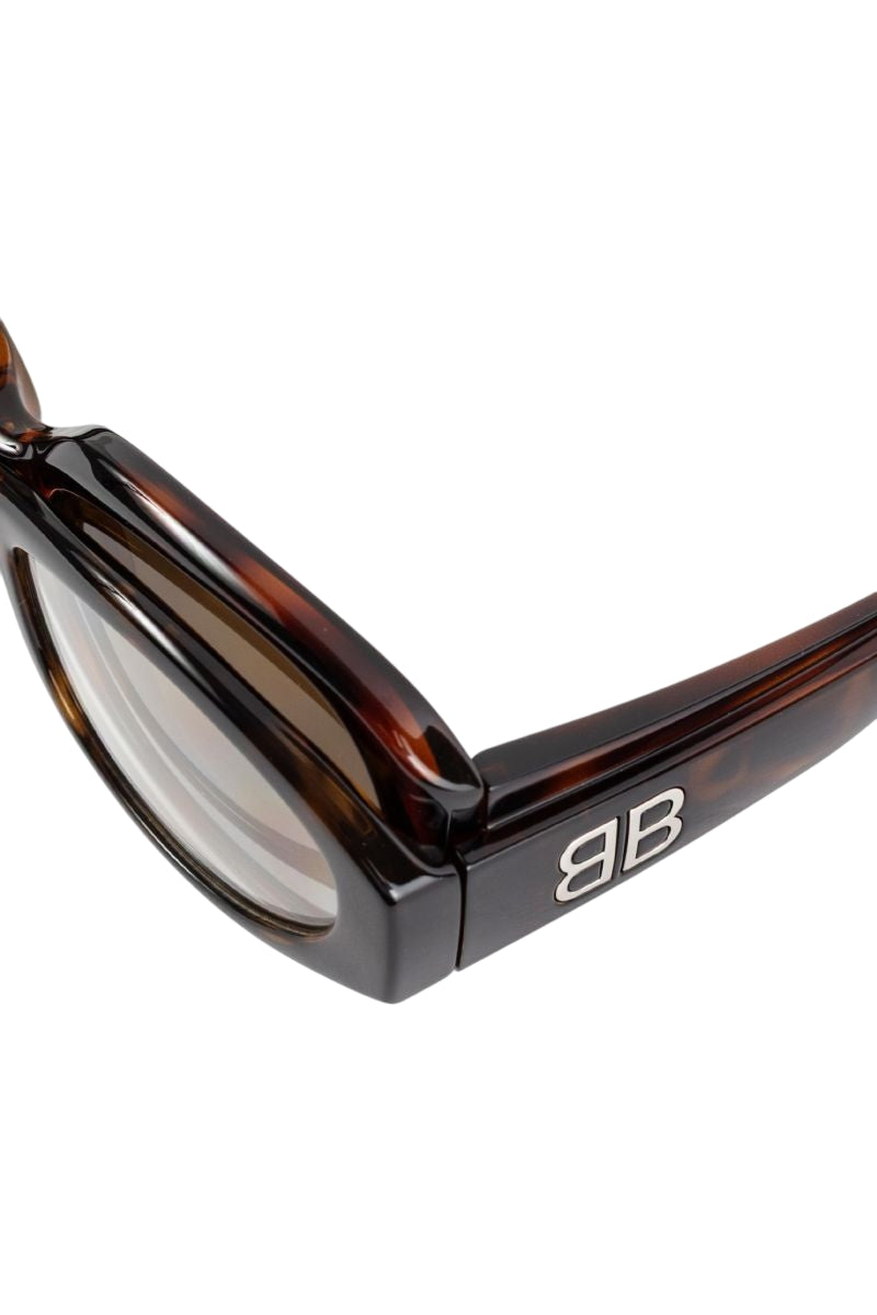 Close-up of Balenciaga sunglasses hardware and fine stitching