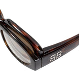 Close-up of Balenciaga sunglasses hardware and fine stitching